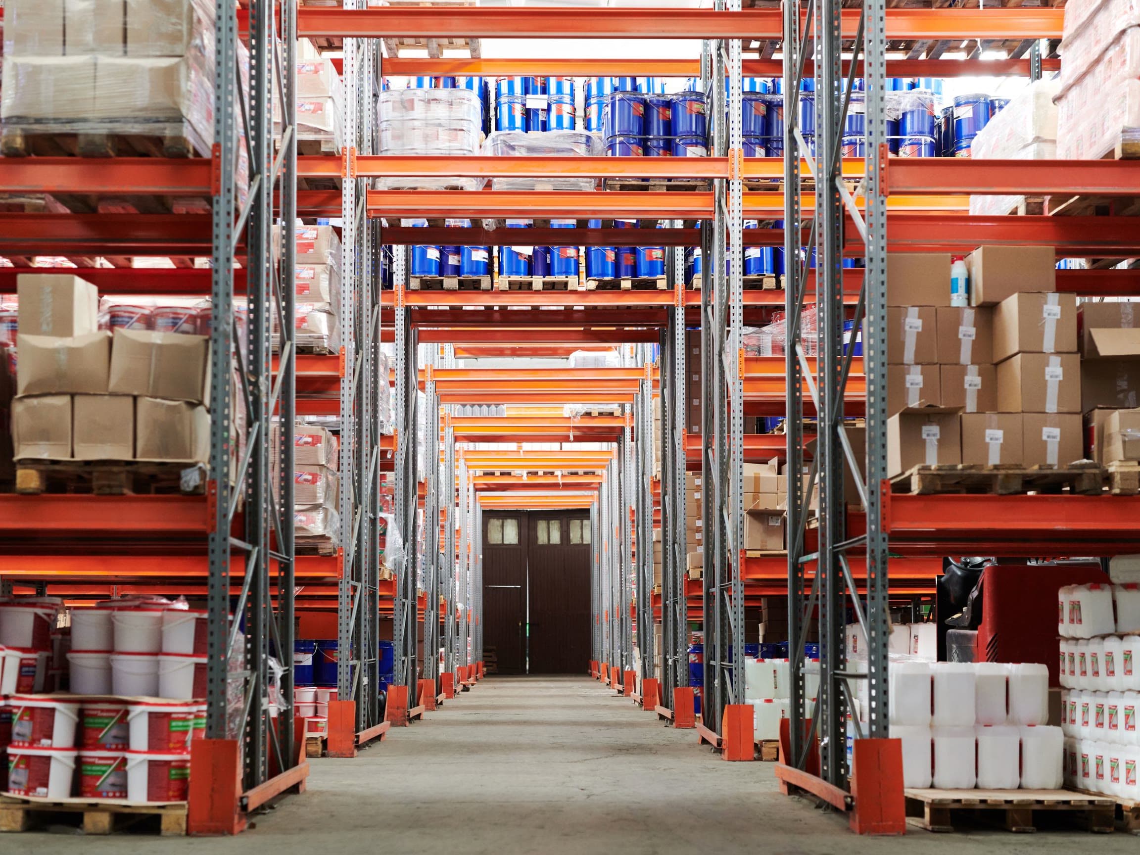 Warehouse shelves stocked with boxes and inventory